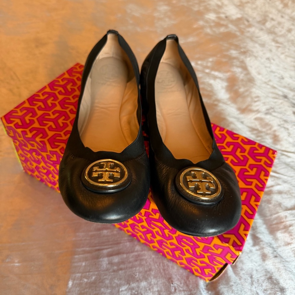 Tory Burch Black Flats with Gold Emblem
